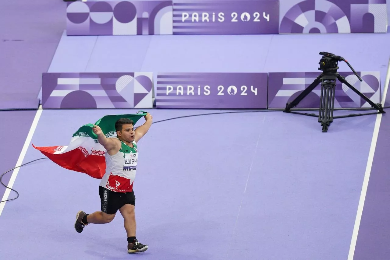 record breaking iranian javelin thrower stripped of paralympic gold over display of religious flag