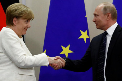 putin seeks common cause with merkel over trump putin seeks common cause with merkel over trump