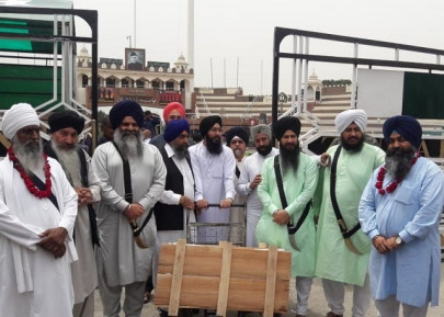 palki sahib for peshawar gurdwara crosses wagah border into pakistan palki sahib for peshawar gurdwara crosses wagah border into pakistan