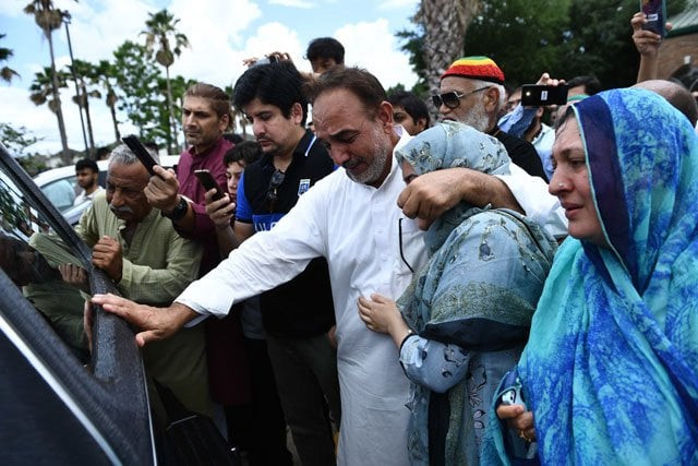 nasir shenwari c holding daughter aunza grieve as the casket of santa fe high school shooting victim sabika sheikh 17 leaves after a funeral service in stafford texas on may 20 2018 photo afp nasir shenwari c holding daughter aunza grieve as the casket of santa fe high school shooting victim sabika sheikh 17 leaves after a funeral service in stafford texas on may 20 2018 photo afp