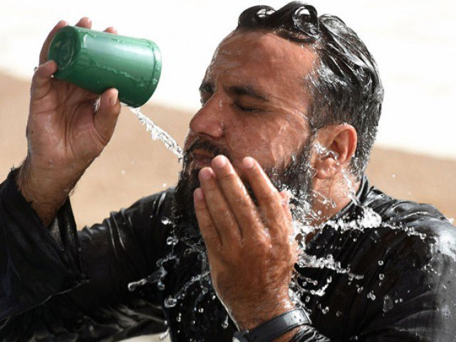 residents of karachi are advised to take precautionary measures during the prevailing heat spell photo afp