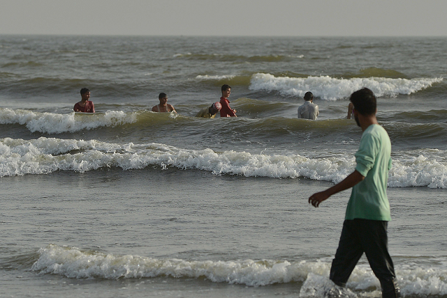 karachiites cool off at clifton beach during a heat wave in karachi on monday residents of karachi were urged to seek shelter monday as the temperature hit 44 degrees celsius sparking fears of widespread heatstroke during the month of ramadan photo afp