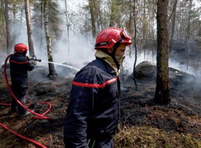 blaze near paris burns on as europe heats up blaze near paris burns on as europe heats up
