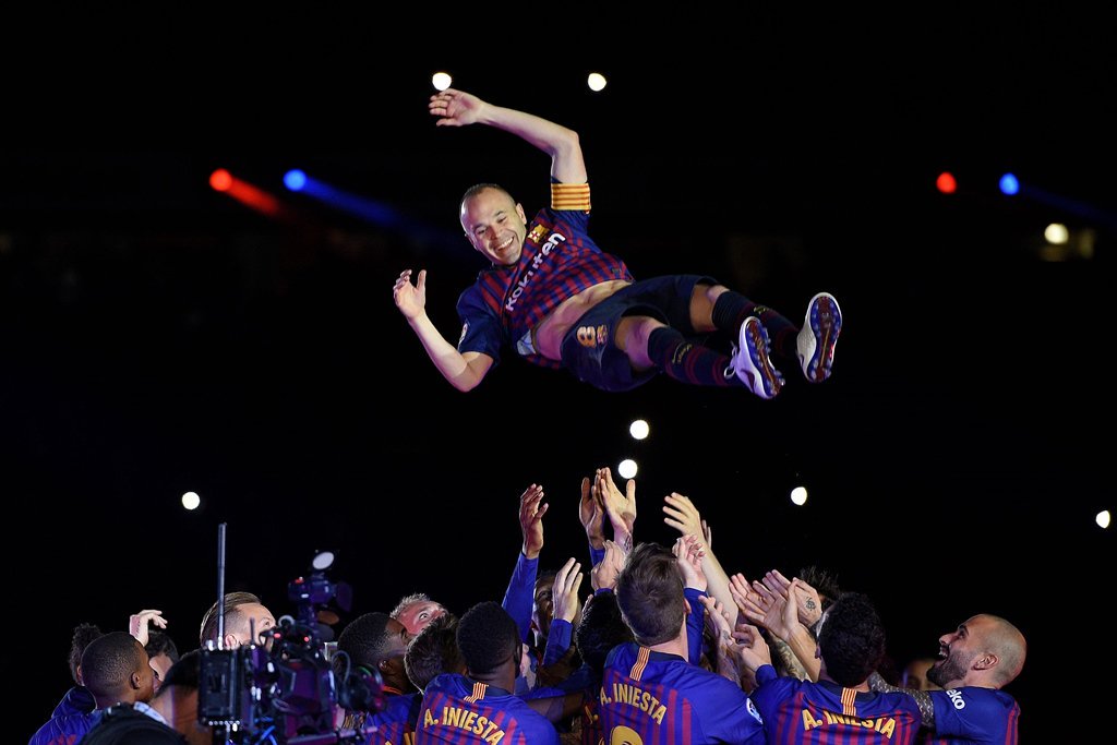 leaving on a high iniesta called time on his barcelona career after playing a pivotal part in their double winning 2017 18 campaign photo afp