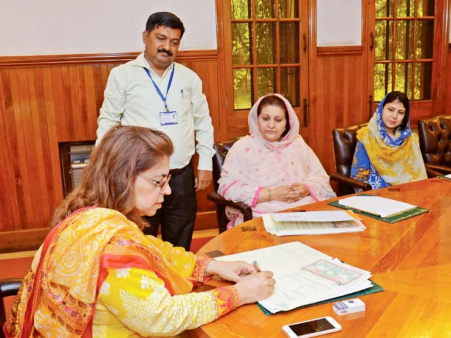 pu vice chancellor and hec chairman sign the agreement during a ceremony photo express pu vice chancellor and hec chairman sign the agreement during a ceremony photo express
