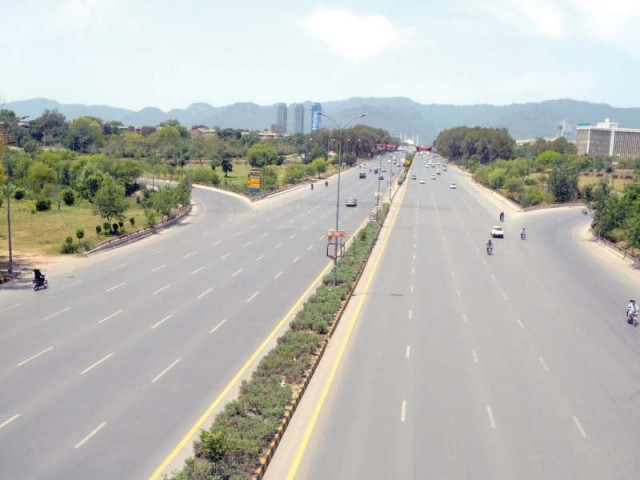the busiest throughfare in the capital wears a deserted look on a hot and sultry afternoon photo express waseem nazir the busiest throughfare in the capital wears a deserted look on a hot and sultry afternoon photo express waseem nazir