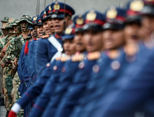 venezuelan soldiers march during a military ceremony to honor president nicolas maduro on may 24 2018 photo afp