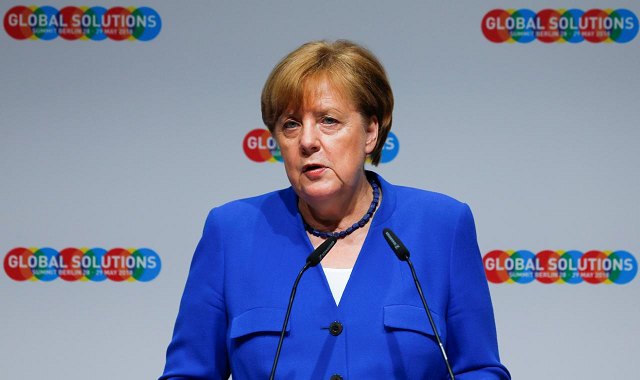 merkel blamed the fraying of the multilateral order on a 039 double transition 039 photo reuters