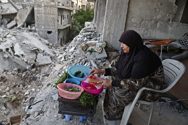 syrian woman raifa wife of mehdi haymur cooks in afrin on may 26 2018 photo afp