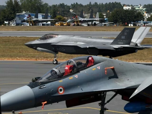 a f 35 fighter jet moves past indian air force s sukhoi su 30mki fighter jet parked on tarmac during the aero india 2025 air show at yelahanka air base in bengaluru india february 11 2025 photo reuters a f 35 fighter jet moves past indian air force s sukhoi su 30mki fighter jet parked on tarmac during the aero india 2025 air show at yelahanka air base in bengaluru india february 11 2025 photo reuters