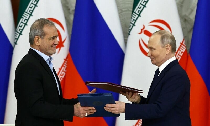 russian president vladimir putin and iranian president masoud pezeshkian attend a documents signing ceremony in moscow russia january 17 2025 photo reuters