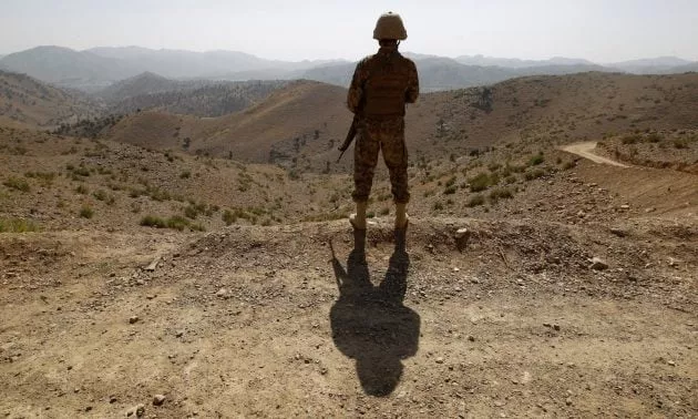 a soldier stands guard outside the kitton outpost on the border with afghanistan in north waziristan pakistan on october 18 2017 photo reuters a soldier stands guard outside the kitton outpost on the border with afghanistan in north waziristan pakistan on october 18 2017 photo reuters