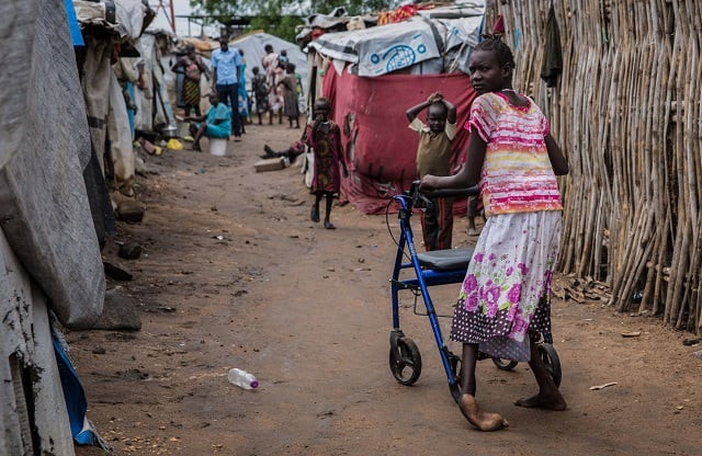 eleven years old nyamet steven who was born with cerebral palsy walks with a walker at mahad camp for internally displaced people idp in juba on april 17 2018 the camp opened in 2014 shortly after the civil war broke out in the country around 7000 people of diverse ethnic backgrounds live in the camp over 200 of them live with a disability photo afp eleven years old nyamet steven who was born with cerebral palsy walks with a walker at mahad camp for internally displaced people idp in juba on april 17 2018 the camp opened in 2014 shortly after the civil war broke out in the country around 7000 people of diverse ethnic backgrounds live in the camp over 200 of them live with a disability photo afp