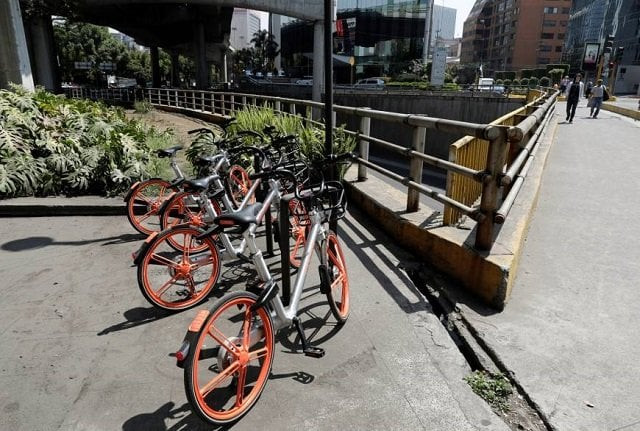 mobikes are parked next to an avenue after chinese bike sharing company mobike launched its service in mexico city mexico february 28 2018 photo reuters mobikes are parked next to an avenue after chinese bike sharing company mobike launched its service in mexico city mexico february 28 2018 photo reuters