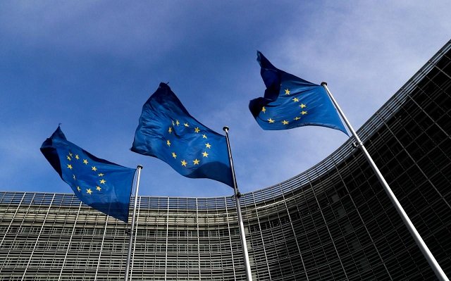 european union flags flutter outside the eu commission headquarters in brussels belgium march 12 2018 photo reuters