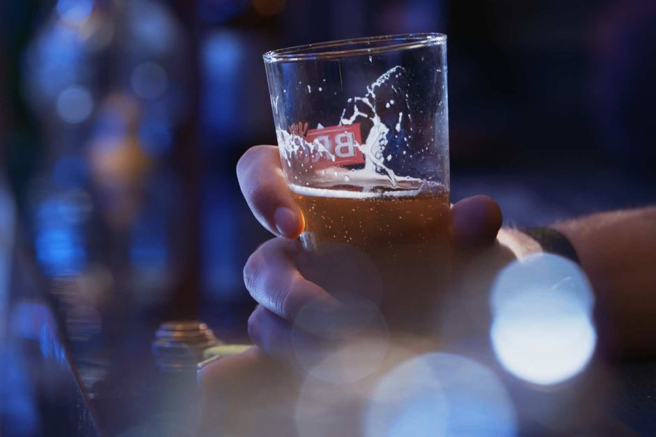 image of a man holding beer photo reuters