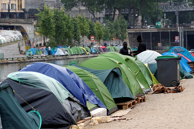 paris police department said authorities were in the process of clearing out two illegal refugee campsites at the porte des poissonniers in northeast paris photo reuters