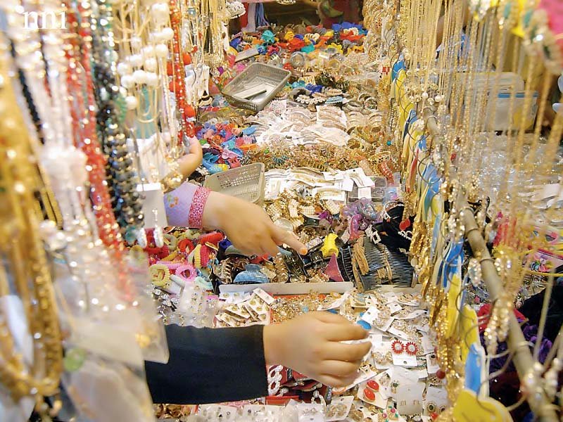 rush of people in bazaars for eid shopping photo agencies