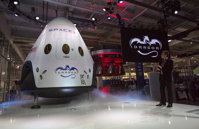 file photo spacex ceo elon musk r unveils the dragon v2 spacecraft in hawthorne california may 29 2014 photo reuters