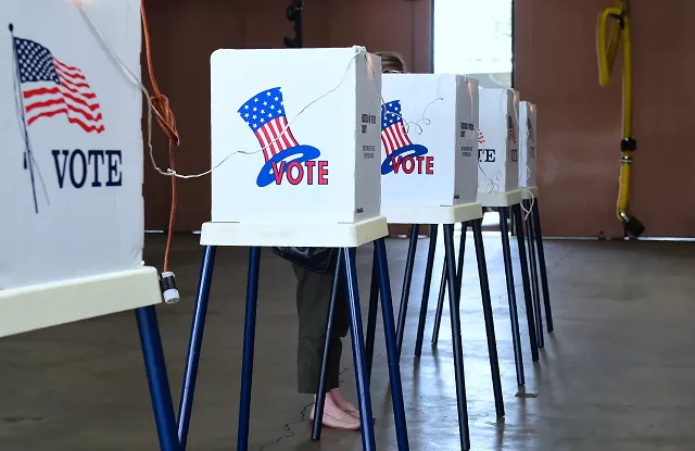 a woman casts her vote at a polling station inside the alhambra fire department in alhambra los angeles county california on june 5 2018 as californians go to the polls today to vote on key primary elections photo afp a woman casts her vote at a polling station inside the alhambra fire department in alhambra los angeles county california on june 5 2018 as californians go to the polls today to vote on key primary elections photo afp