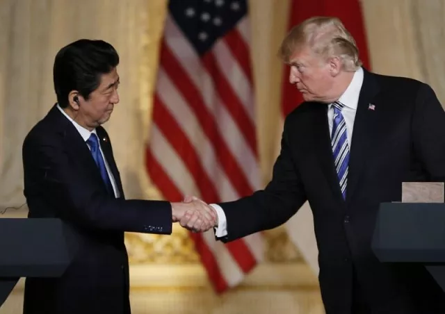 trump is pressing tokyo for a bilateral free trade agreement while japan insists multilateral deals work best photo reuters trump is pressing tokyo for a bilateral free trade agreement while japan insists multilateral deals work best photo reuters