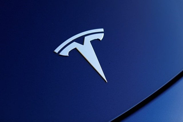 the front hood logo on a 2018 tesla model 3 electric vehicle is shown in this photo illustration taken in cardiff california us june 1 2018 photo reuters the front hood logo on a 2018 tesla model 3 electric vehicle is shown in this photo illustration taken in cardiff california us june 1 2018 photo reuters