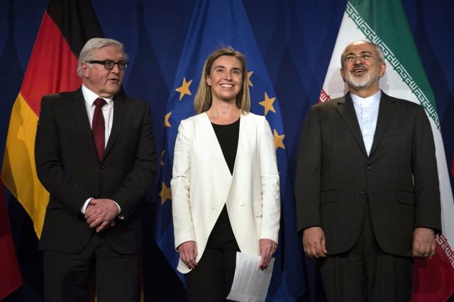 iranian foreign minister javad zarif r waits to make a statement flanked by german foreign minister frank walter steinmeier l and european union high representative for foreign affairs and security policy federica mogherini at the swiss federal institute of technology in lausanne ecole polytechnique federale de lausanne on april 2 2015 after iran nuclear program talks finished with extended sessions photo afp iranian foreign minister javad zarif r waits to make a statement flanked by german foreign minister frank walter steinmeier l and european union high representative for foreign affairs and security policy federica mogherini at the swiss federal institute of technology in lausanne ecole polytechnique federale de lausanne on april 2 2015 after iran nuclear program talks finished with extended sessions photo afp
