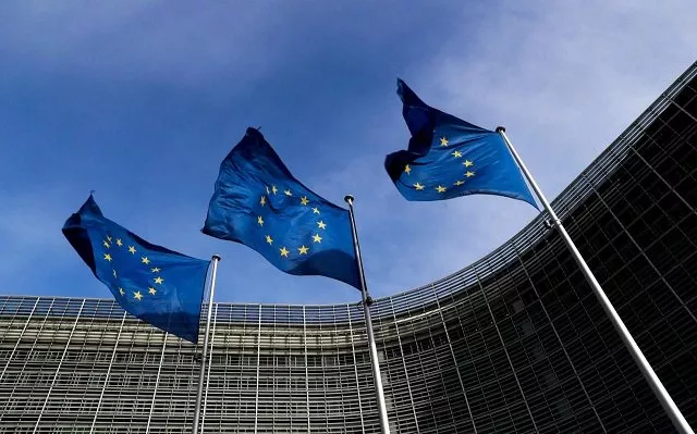 european union flags flutter outside the eu commission headquarters in brussels belgium photo reuters