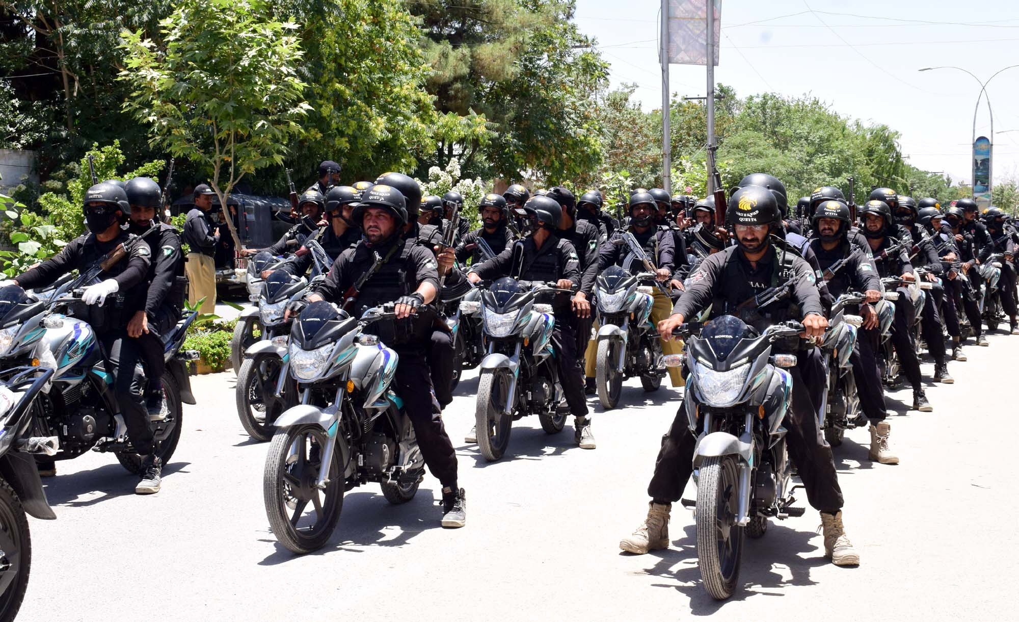 the 400 newly recruited personnel of the eagle force conducting a flag march in quetta photo express