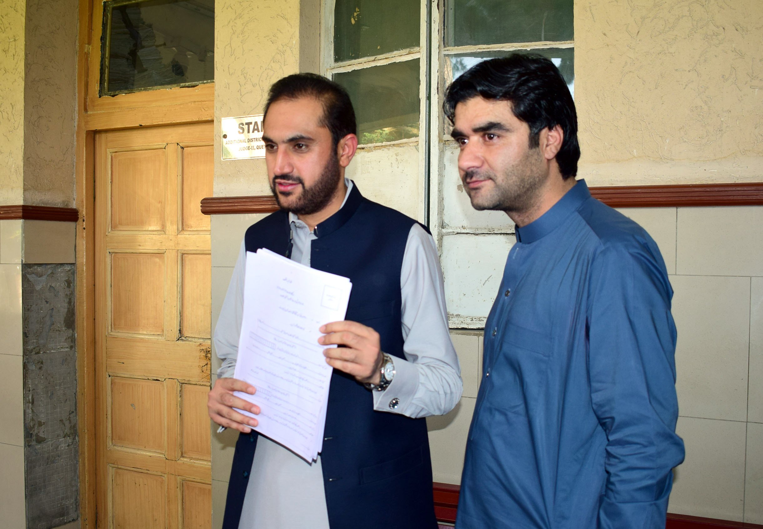 former chief minister abdul quddus bizenjo shows the nomination papers of pb 29 photo express