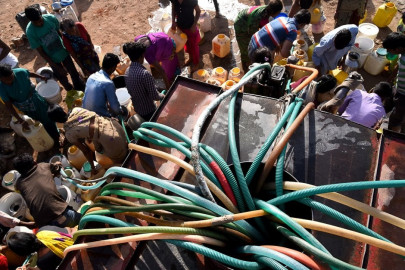 tempers fray fists fly in india s daily battle for water