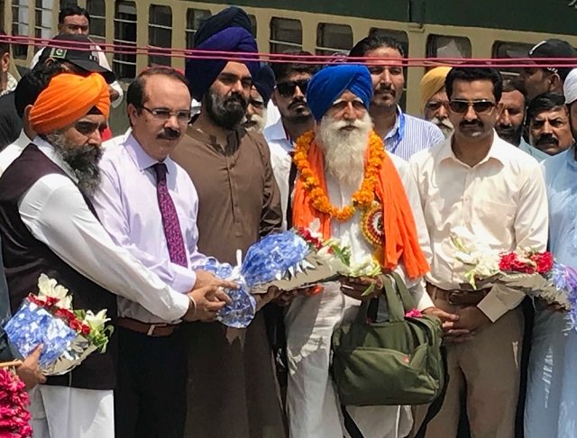 despite boycott from official sikh committees in india 84 pilgrims reach pakistan on 9 day long trip on friday photo express