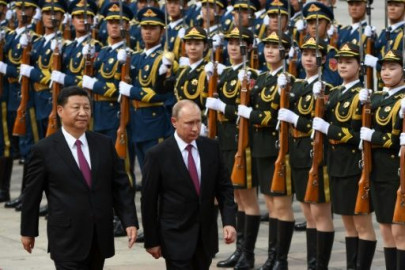 china hosts russia iran for summit as us tensions rise china hosts russia iran for summit as us tensions rise