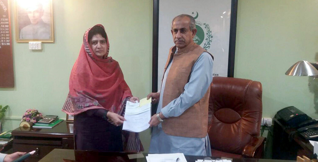 former balochistan assembly speaker rahila hameed khan durrani submitting nomination forms for reserved national assembly and provincial assembly seats with election commissioner niyaz baloch photo express