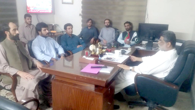 pakistan tehreek e insaf balochistan chapter president yar muhammad rind talking to party workers at his office in quetta photo express