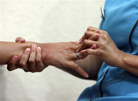 a woman receives a massage treatment in a beauty salon photo reuters