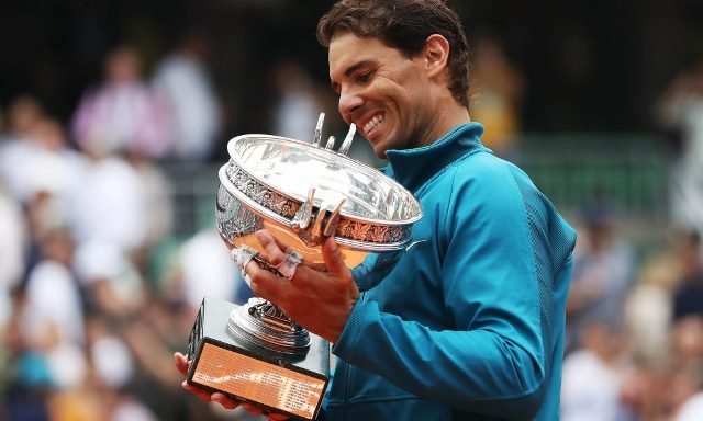 rafael nadal brushed aside dominic thiem in straight sets to win his 11th title at roland garros to further consolidate his claim as the undisputed king of clay photo afp