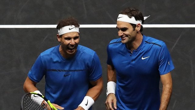 roger federer and rafael nadal left have won a total number of 37 grand slam titles combined photo afp