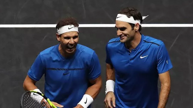roger federer and rafael nadal left have won a total number of 37 grand slam titles combined photo afp roger federer and rafael nadal left have won a total number of 37 grand slam titles combined photo afp