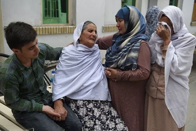 afghan women weep for their relatives at the isteqlal hospital following a suicide attacker blew himself up among government ministry employees in kabul on june 11 2018 photo afp afghan women weep for their relatives at the isteqlal hospital following a suicide attacker blew himself up among government ministry employees in kabul on june 11 2018 photo afp