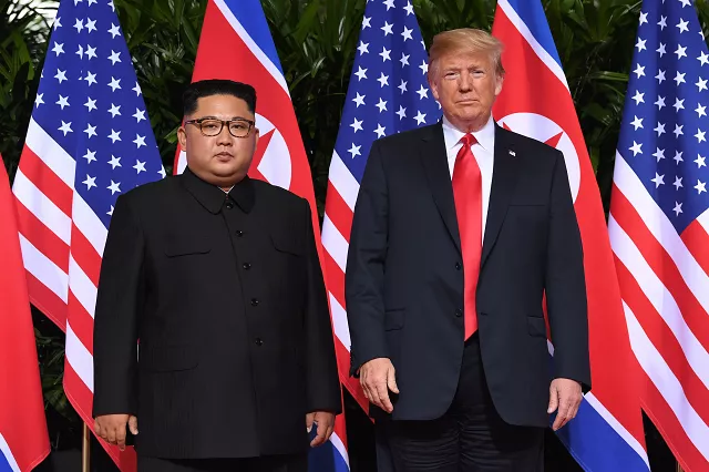 us president donald trump r and north korea 039 s leader kim jong un l pose together at the start of their historic us north korea summit at the capella hotel on sentosa island in singapore on june 12 2018 donald trump and kim jong un have become on june 12 the first sitting us and north korean leaders to meet shake hands and negotiate to end a decades old nuclear stand off photo afp us president donald trump r and north korea 039 s leader kim jong un l pose together at the start of their historic us north korea summit at the capella hotel on sentosa island in singapore on june 12 2018 donald trump and kim jong un have become on june 12 the first sitting us and north korean leaders to meet shake hands and negotiate to end a decades old nuclear stand off photo afp