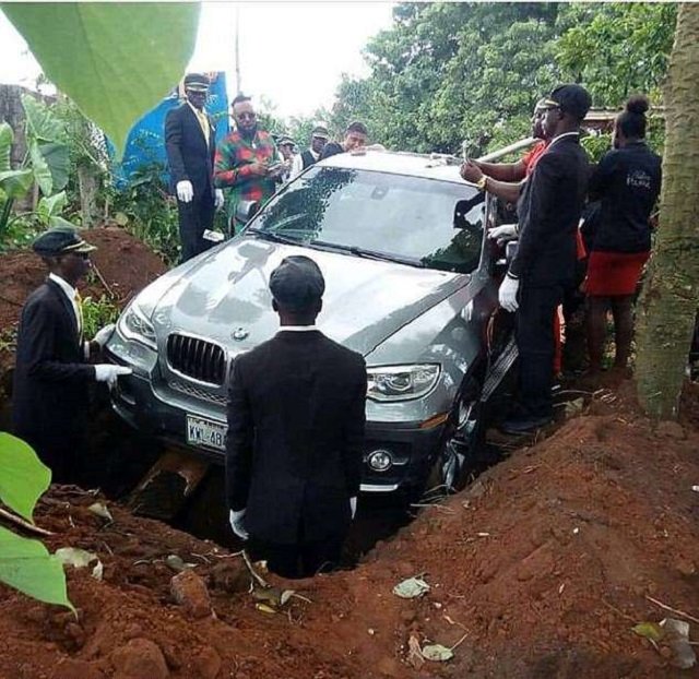 the picture has gone viral on social media as pall bearers reportedly guided it down logs into position and then the logs were pulled out to allow the vehicle to drop photo courtesy jamie pyatt news