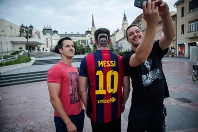 fans amass to see messi at training session fans amass to see messi at training session
