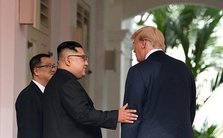 kim invites trump to visit pyongyang photo online