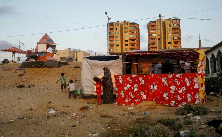 gaza employees await salaries as eid approaches photo afp