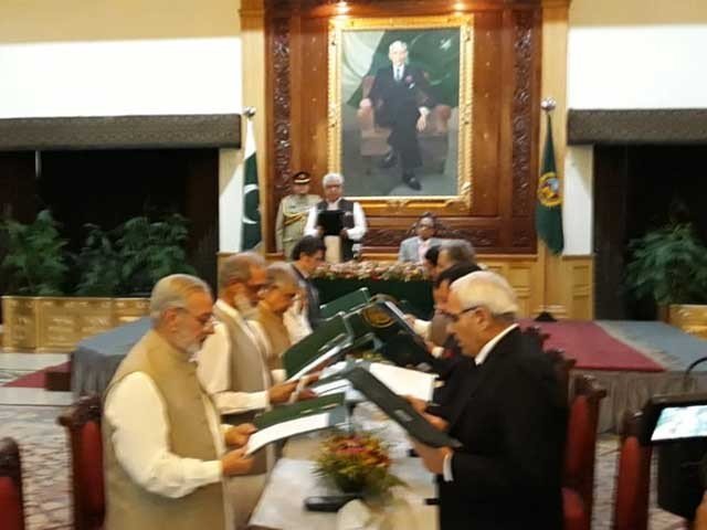 oath was administered by governor k p iqbal zafar jhagra photo express
