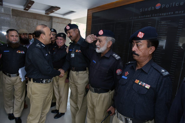 ad khowaja being seen off by senior police officers at the central police office photo courtesy central police office ad khowaja being seen off by senior police officers at the central police office photo courtesy central police office