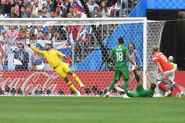 russia 039 s midfielder yuri gazinskiy r scores the opener during the russia 2018 world cup group a football match between russia and saudi arabia at the luzhniki stadium in moscow on june 14 2018 photo afp russia 039 s midfielder yuri gazinskiy r scores the opener during the russia 2018 world cup group a football match between russia and saudi arabia at the luzhniki stadium in moscow on june 14 2018 photo afp