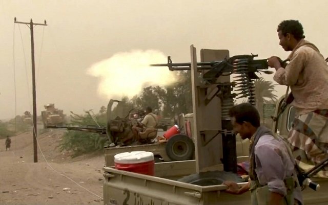 yemeni government forces fire on rebel positions around hodeida 039 s disused airport as they press a saudi backed offensive against the red sea port city on june 15 2018 photo afp