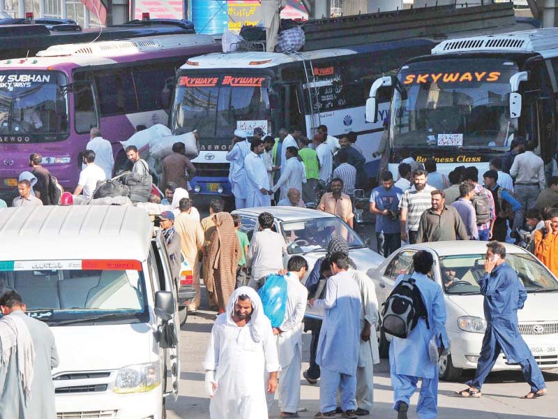 people travel by buses to reach hometowns for eid photos express